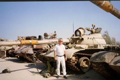 With abandoned Iraqi tanks in Kuwait November, 1993 paul d. maley, solar eclipse
